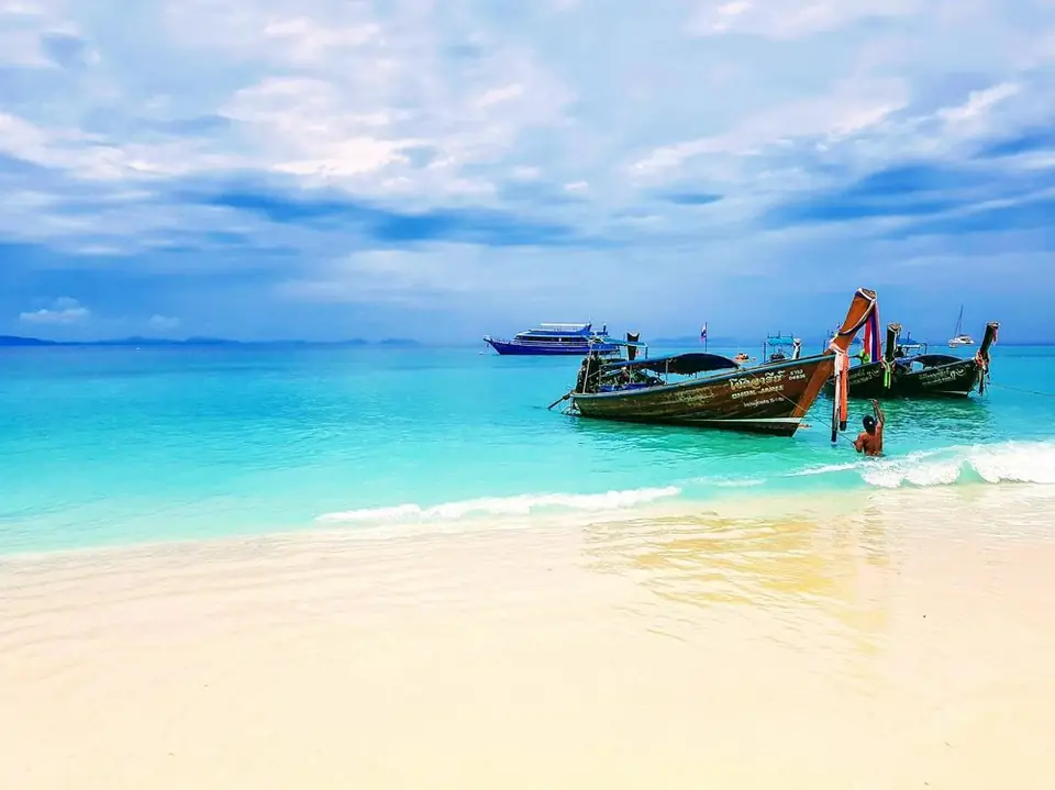 Beach with a long-tail boat